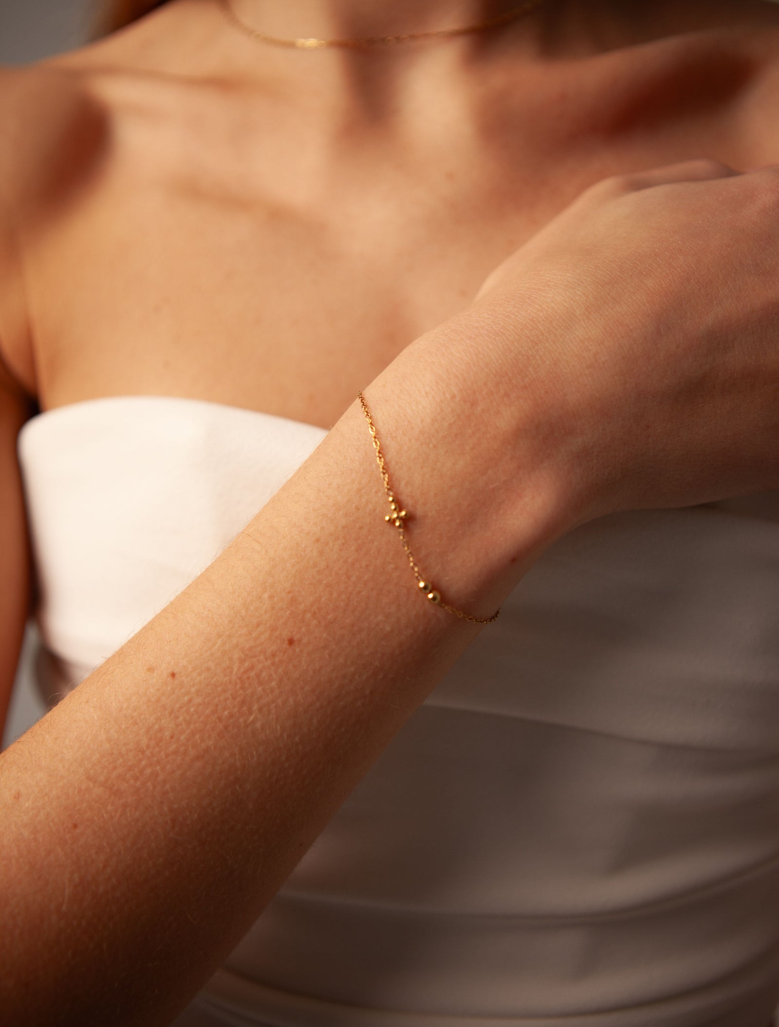 Złota bransoletka z krzyżykiem Cross